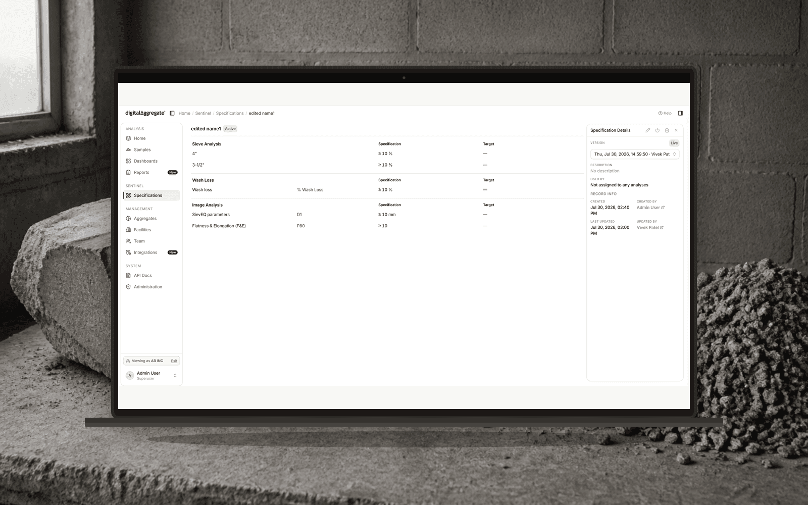 digitalΔggregate Sentinel specifications on a laptop over concrete and aggregate